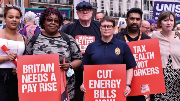 CSP members on picket line with signs saying Britain needs a pay rise