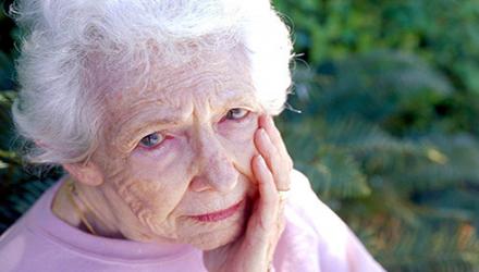 elderly-woman-seated-500x